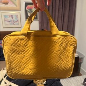 Yellow Quilted Travel Bag with Textured Design